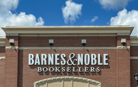Barnes and Noble Booksellers storefront sign on a brick building exterior under a bright blue sky. August 27, 2026. Mishawaka, IN USA 