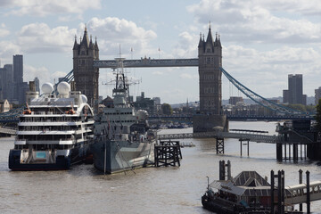 Tower Bridge with cruise ship and warship on the River Thames London © Tade