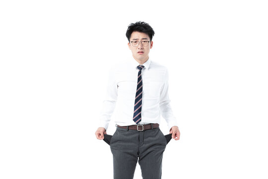 Frustrated businessman showing empty pockets, financial loss concept
