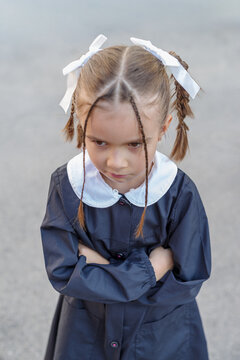 School girl wearing a school uniform at first day of school