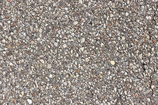 A close view of the road pavement surface.