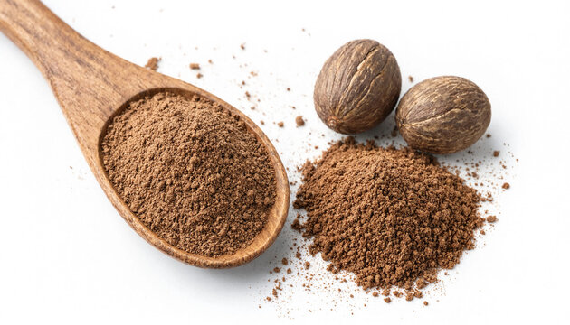 Ground nutmeg powder in a wooden spoon and whole nutmeg seeds