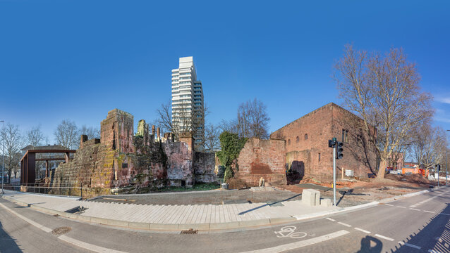 historic ruins of the Kaiserpfalz - Imperial Palace - in Kaiserslautern and modern skyscraper town hall and castle.