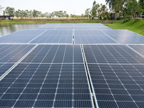 Floating solar panels generating clean renewable energy on water surface