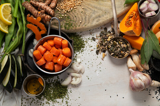 Fresh vegetables, fruits, beans and nuts. Food cooking background.