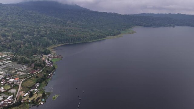 Aerial view of lake beratan and balinese farming village