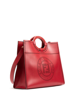 Luxury red leather Fendi handbag isolated on white background