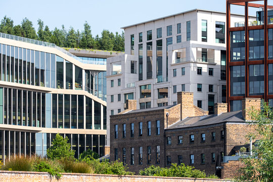 Modern buildings and historic brick structures in The City in London, with urban architecture forming a skyline of modern buildings and historic brick structures