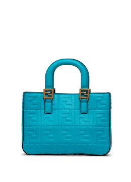 Luxury blue leather Fendi handbag isolated on white background
