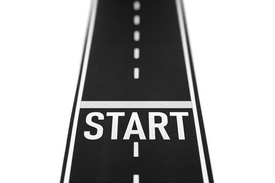 New beginning and future career perspective with start word on road.