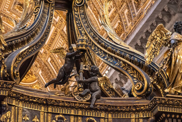 Rome, Italy - March 30, 2026 - Angels with papal tiara and keys on the baldachin inside Saint Peters Basilica Rome © imagoDens