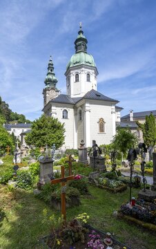 Graves at St. Peter Cemetery with St. Peter Collegiate Church, Old Town, Salzburg, Austria