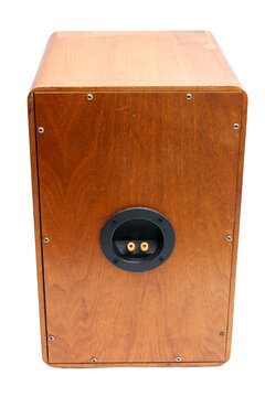 A vintage wooden speaker with a grill isolated on white background. Classic wooden loudspeaker, classic design and potential for high quality sound.