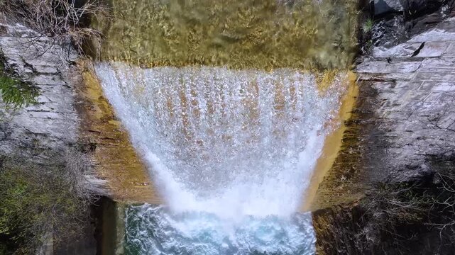 Aerial view from a drone of a dam in the vicinity of the Or&oacute;s Bajo waterfall in the village of Or&oacute;s Bajo, Biescas, Alto Gallego region, Huesca, Aragon, Spain, Europe.