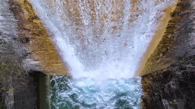Aerial view from a drone of a dam in the vicinity of the Or&oacute;s Bajo waterfall in the village of Or&oacute;s Bajo, Biescas, Alto Gallego region, Huesca, Aragon, Spain, Europe.