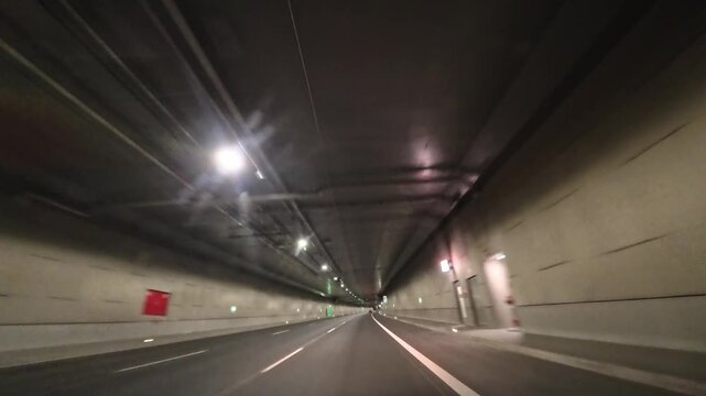 Timelapse of traffic on Expressway with Underground Road Tunnel and flyovers at dusk