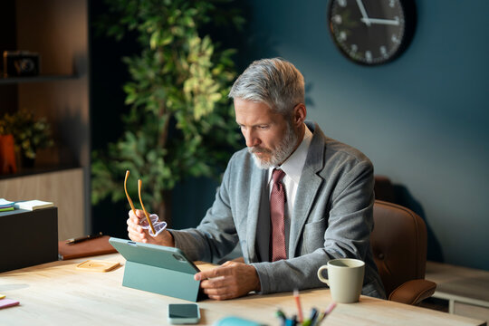 Senior Businessman Working in Office