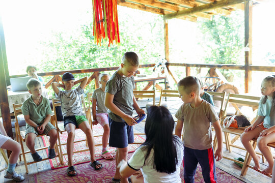 Children with Down syndrome are vacationing at a camp.