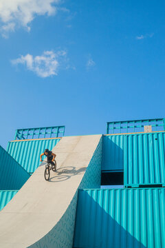 Rider On Mountain Bike Rides Extremely Off The Ramp