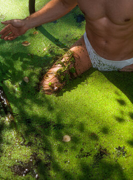 Man Comes Out Of Wild Green Forest Nature Swamp