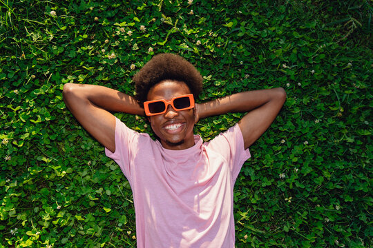 Relaxing On Grass In Sunglasses