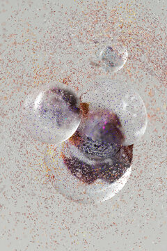 Abstract Glass Bubbles in Colorful Particle Field