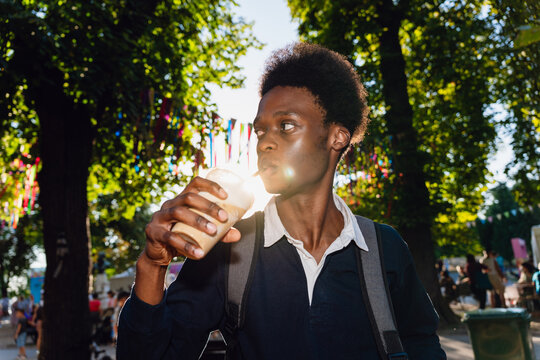 Drinking Iced Coffee Outdoors