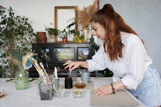 Mixing Cyanotype Chemicals in a Bright Studio