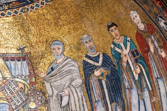 Rome, Italy - March 30, 2026 - Close-up of the four figures to the right of Jesus in the apse mosaic of Santa Maria in Trastevere Rome
