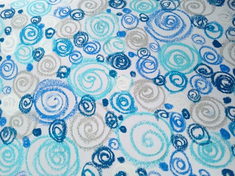 A continuous background pattern of blue, light blue, and silver spirals and swirls on white.