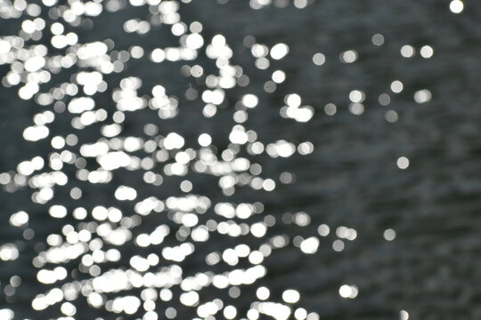 A dreamy view of water drops on black background.