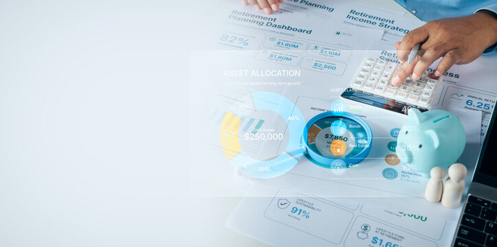 Financial planner using a calculator on retirement planning and asset allocation documents with a blue piggy bank on a white desk with copy space, concept of wealth management and investment strategy.
