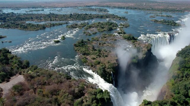 Aerial view of Victoria Falls and the Zambezi River plunging into the gorge