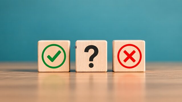 Three wooden blocks displaying a green checkmark, a black question mark, and a red cross symbol against a teal background, representing decision-making and evaluation.