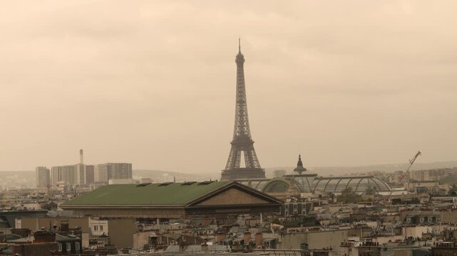 Eiffel Tower Rising Above the Historic Rooftops and Skyline of Paris, France
