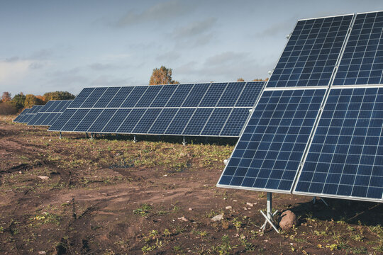 View of solar panels installed in a field in Tartu County, Estonia.