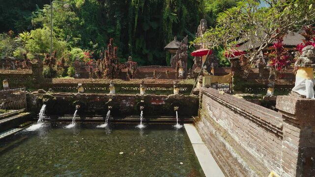 Sacred water pools at Pura Gunung Kawi Sebatu Hindu temple in Ubud, Bali, Indonesia