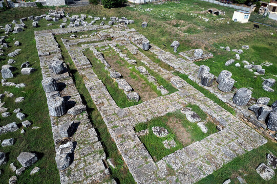 View of the archaeological remains of the Temple of Athena Alea at Tegea, 4th c. BC, revealing the monumental rectangular plan of the sanctuary and its surviving stone foundations