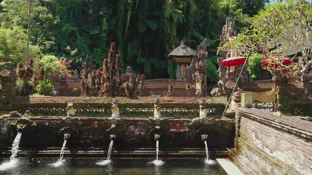 Sacred water pools at Pura Gunung Kawi Sebatu Hindu temple in Ubud, Bali, Indonesia