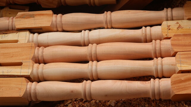 Turned Wooden Furniture Legs with Traditional Woodworking Craftsmanship and Natural Wood Grain


