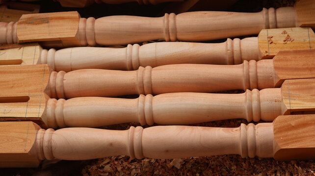 Turned Wooden Furniture Legs with Traditional Woodworking Craftsmanship and Natural Wood Grain


