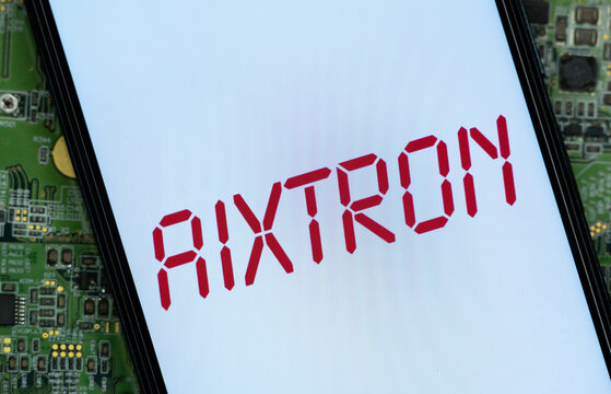 Herzogenrath, Germany - 01 October 2026: Close-up of Aixtron logo on a smartphone screen.
