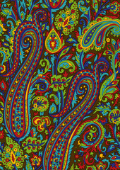 Seamless repeating pattern with paisley motifs placed at different angles, balanced by smaller floral elements and filler © Venkatsai
