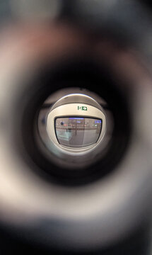 View Through a Train Door Peephole Looking Into a Passenger Compartment