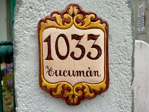 Vintage house number sign on a wall
