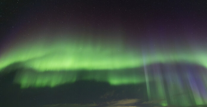 Northern Lights Aurora.  Aurora borealis. A wonderful night with northern lights in iceland. Icelandic spiral northern lights.