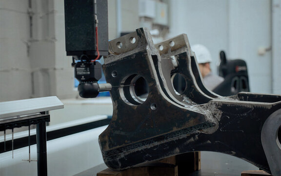 CMM Measuring Metal Component in Workshop