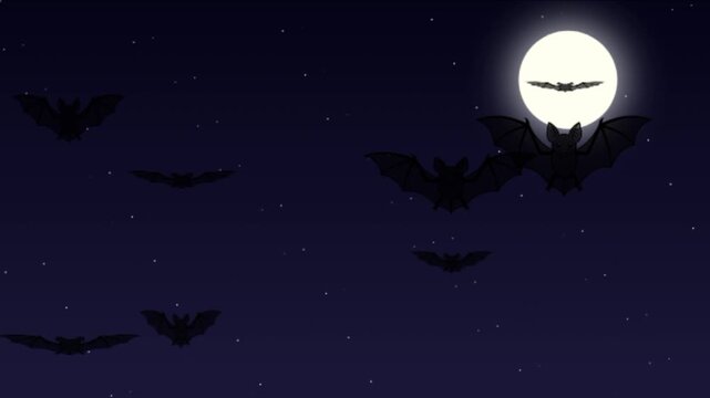 Silhouette of flying bats against a full moon in the dark night sky.