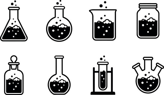 Collection of vintage style science laboratory glassware with liquid solutions inside