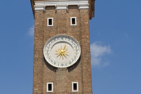  A 24-hour clock with a sun in the center at the Church of Santi Apostoli in Venice